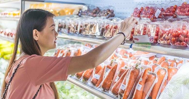 Vietnamese woman shopping in a supermarket