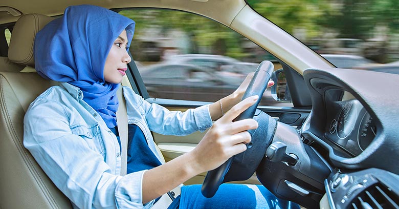 Indonesian woman driving a car
